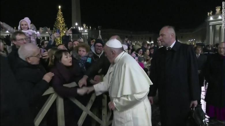 Pope Francis apologizes for losing his temper and smacking a woman's hand